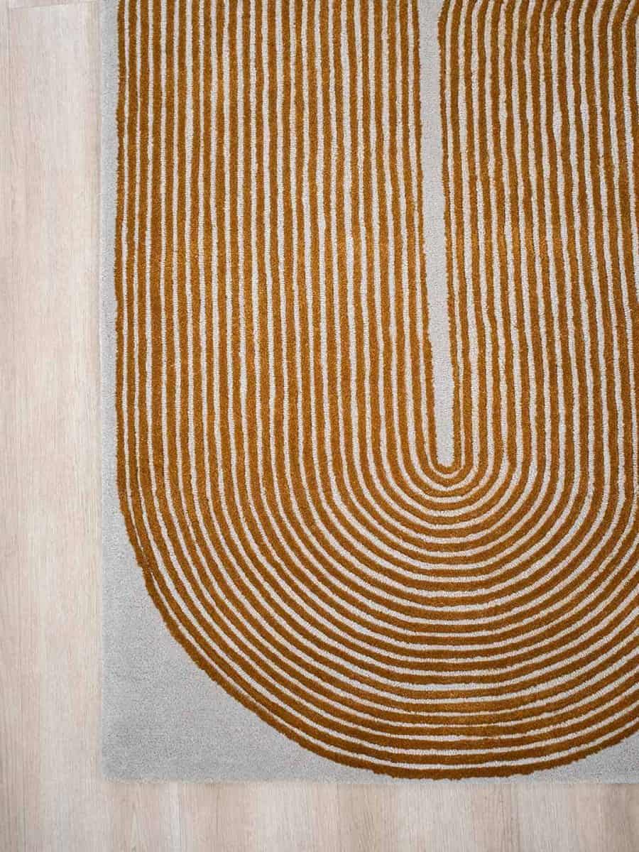 Viper-golden-stans-rug-centre-wool-rug-carved-orange-wool-carver-curves